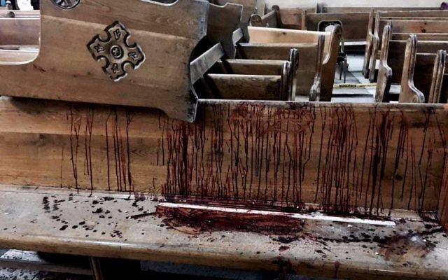 Blood stains pews inside the St. George Church after a suicide bombing in the Nile Delta town of Tanta, Egypt, Sunday, April 9, 2017. (AP Photo/Nariman El-Mofty) Blood stains pews inside the St. George Church after a suicide bombing in the Nile Delta town of Tanta, Egypt, Sunday, April 9, 2017. (AP Photo/Nariman El-Mofty)