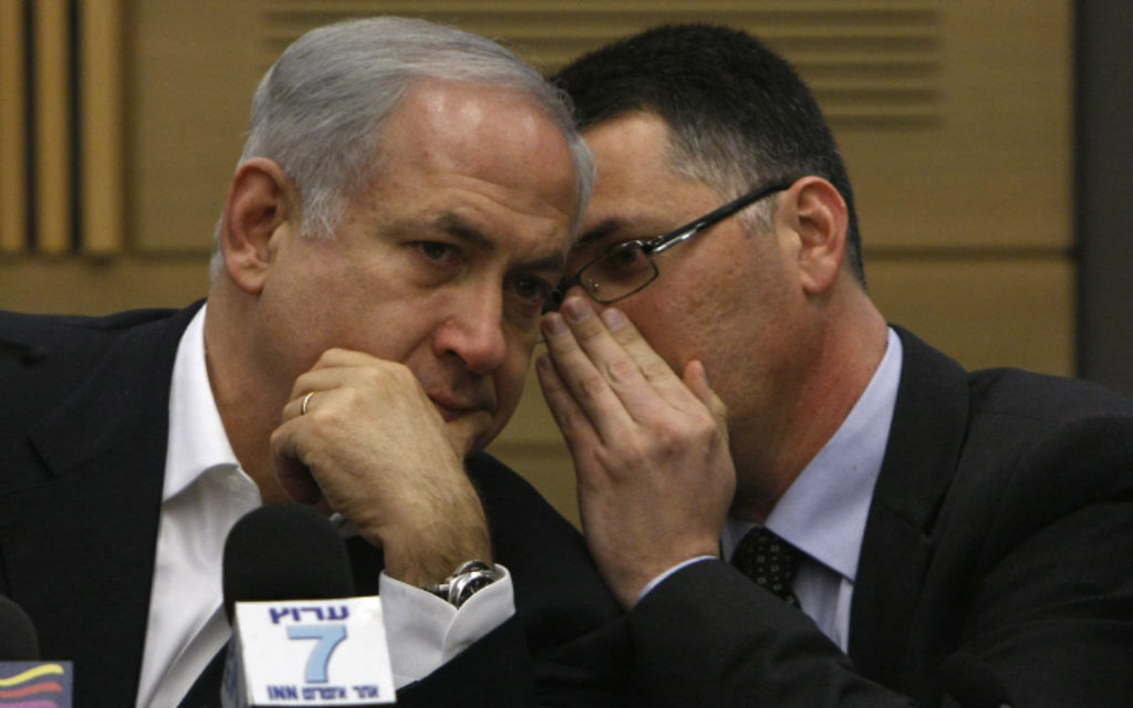 Israel's Likud party leader Benjamin Netanyahu speaks with Gideon Sa'ar at the party meeting in the Knesset in Jerusalem March 2, 2009. (Miriam Alster / FLASH90.) Israel's Likud party leader Benjamin Netanyahu speaks with Gideon Sa'ar at the party meeting in the Knesset in Jerusalem March 2, 2009. (Miriam Alster / FLASH90.)