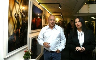 Dani Dankner, left, seen on February 1, 2008, during his tenure as Chairman of the Board of Directors of Bank Hapoalim. (Roni Schutzer/Flash 90)