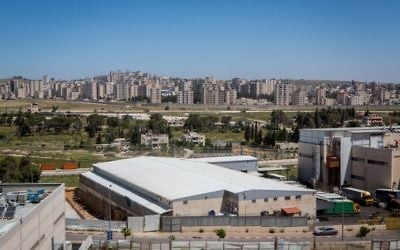 The Atarot industrial zone, with the Ramallah suburb Kafr Aqab seen in the background. (Miriam Alster/Flash90)