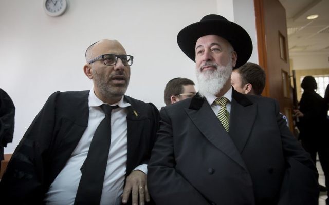 Former Chief Rabbi of Israel, Yona Metzger (r) seen at the Jerusalem District Court during his trial, suspected of taking bribe, fraud, and involvement in criminal activities, on February 23, 2017. (Miriam Alster/Flash90) Former Chief Rabbi of Israel, Yona Metzger (r) seen at the Jerusalem District Court during his trial, suspected of taking bribe, fraud, and involvement in criminal activities, on February 23, 2017. (Miriam Alster/Flash90)