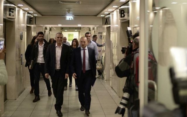 Finance Minister Moshe Kahlon, left, and Education Minister Naftali Bennett arrive at a press conference at the Education Ministry on March 19, 2017. (Tomer Neuberg/Flash90) Finance Minister Moshe Kahlon, left, and Education Minister Naftali Bennett arrive at a press conference at the Education Ministry on March 19, 2017. (Tomer Neuberg/Flash90)