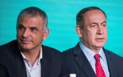 Finance Minister Moshe Kahlon (L) and Prime Minister Benjamin Netanyahu at a signing ceremony for an agreement to build thousands of new apartments in the ultra orthodox neighborhood of Ramat Beit Shemesh, April 3, 2017. (Photo by Hadas Parush/Flash90)