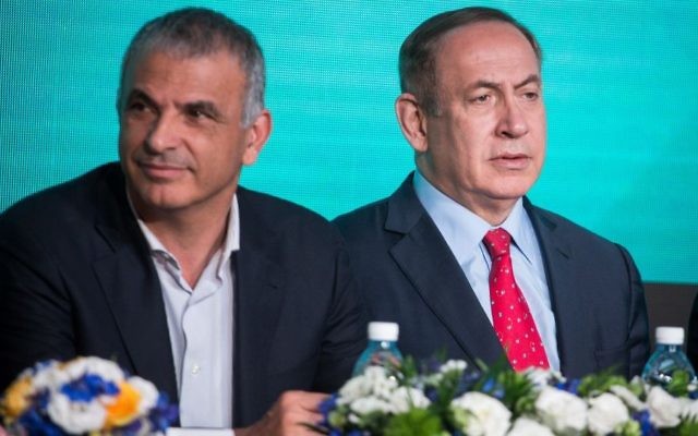 Finance Minister Moshe Kahlon, left, and Prime Minister Benjamin Netanyahu at a signing ceremony for an agreement to build thousands of new apartments in the ultra-Orthodox neighborhood of Ramat Beit Shemesh, April 03, 2017. (Hadas Parush/FLASH90) Finance Minister Moshe Kahlon, left, and Prime Minister Benjamin Netanyahu have promised to cut taxes for citizens in light of a surplus of tax revenues. (April 03, 2017; Hadas Parush/FLASH90)