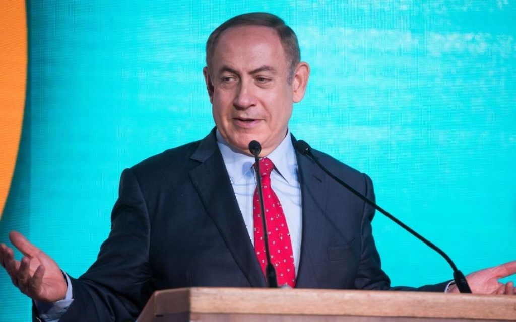 Prime Minister Benjamin Netanyahu speaks at a signing ceremony for an agreement to build thousands of new apartments in the ultra-Orthodox neighborhood of Ramat Beit Shemesh, April 3, 2017. (Hadas Parush/FLASH90)