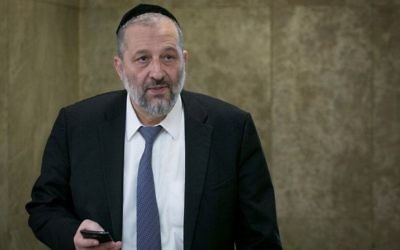 Interior Minister Aryeh Deri arrives to the weekly cabinet meeting at the Prime Minister's Office in Jerusalem on April 9, 2017. (Ohad Zwigenberg/Pool)