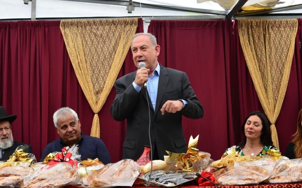 Prime Minister Benjamin Netanyau attends the Jewish Moroccan celebration of Mimouna, in the Negev city of Dimona on April 18, 2017. (Kobi Gideon / GPO)