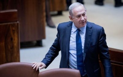 Prime Minister Benjamin Netanyahu seen at the Knesset during a vote on a law to delay the launch of the new broadcaster at the Knesset plenum on April 25, 2017. (Yonatan Sindel/Flash90)