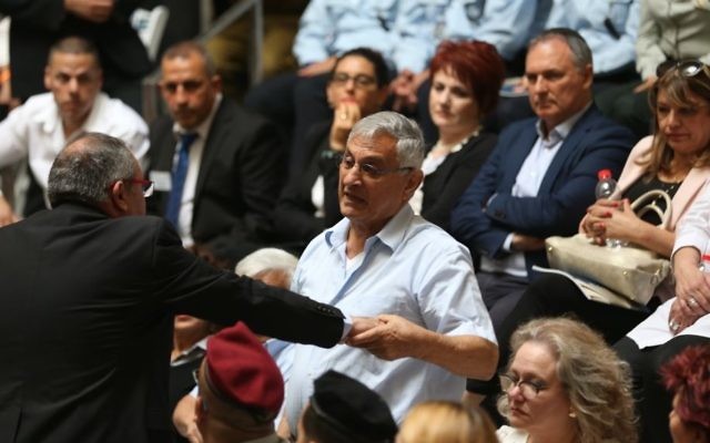 A bereaved father, Shaul Chitiyat, interrupts the speech of Prime Minister Benjamin Netanyahu during the official opening ceremony of the new National Memorial Hall at the entrance to the military cemetery on Mount Herzl, in Jerusalem on April 30, 2017. (Yonatan Sindel/Flash90) A bereaved father, Shaul Chitiyat, interrupts the speech of Prime Minister Benjamin Netanyahu during the official opening ceremony of the new National Memorial Hall at the entrance to the military cemetery on Mount Herzl, in Jerusalem on April 30, 2017. (Yonatan Sindel/Flash90)