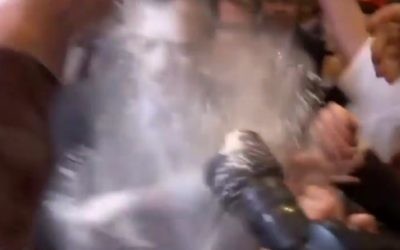 French presidential candidate Francois Fillon gets covered in flour during a campaign event in Strasbourg, France on April 6, 2017. (Screenshot)
