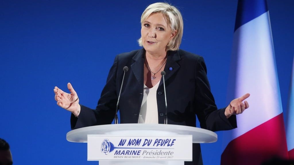National Front leader and presidential candidate Marine Le Pen addresses supporters at her election day headquarters in Henin-Beaumont, northern France, Sunday, April 23, 2017. (AP Photo/Michel Spingler) National Front leader and presidential candidate Marine Le Pen addresses supporters at her election day headquarters in Henin-Beaumont, northern France, Sunday, April 23, 2017. (AP Photo/Michel Spingler)