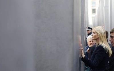 Ivanka Trump, daughter and adviser of US President Donald Trump, touches a slab when visiting the Memorial to the Murdered Jews of Europe after attending the W20 Summit in Berlin Tuesday, April 25, 2017. (AP Photo/Ferdinand Ostrop)