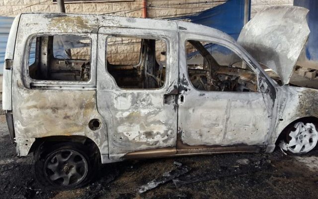 A Palestinian car torched in the West Bank village of Hawara on April 26, 2017 (Rabbis for Human Rights) A Palestinian car torched in the West Bank village of Hawara on April 26, 2017 (Rabbis for Human Rights)