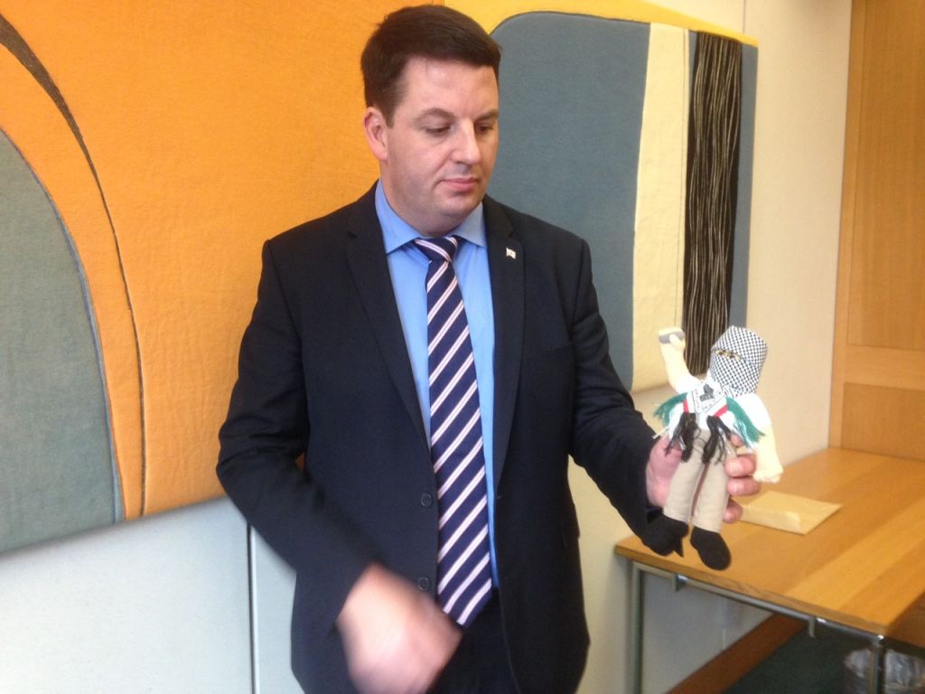 British MP Andrew Percy holds a terror doll teaching aid used in Palestinian schools. (Jenni Frazer/Times of Israel) British MP Andrew Percy holds a terror doll teaching aid used in Palestinian schools. (Jenni Frazer/Times of Israel)