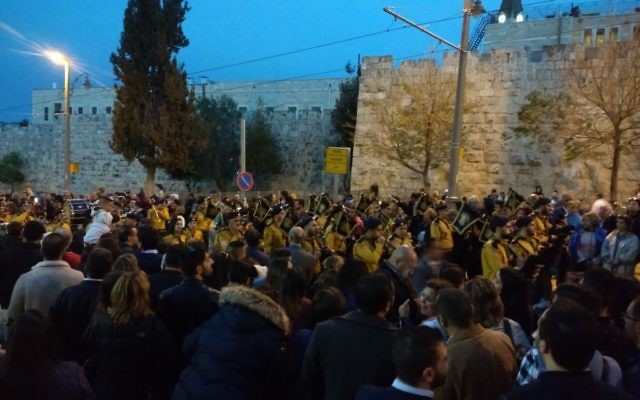 Christian scouts take part in Palm Sunday celebrations outside the Old City in Jerusalem on April 9, 2017. (Ilan Ben Zion/Times of Israel) 