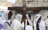 Ethiopian Christian pilgrims attend a Good Friday procession in Jerusalem, Friday, April 14, 2017. (Dan Balilty/AP)