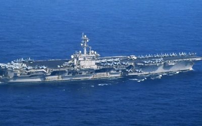 The USS Carl Vinson sails offshore Nagasaki prefecture, southern Japan Saturday, April 29, 2017 (Kyodo News via AP)