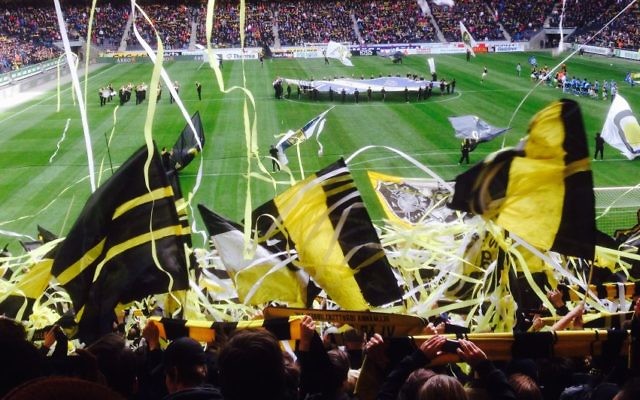 Fans of Sweden's AIK soccer team celebrate at Friends Arena in Sweden, 2015, (CC BY-SA Lummern, Wikimedia Commons) Fans of Sweden's AIK soccer team celebrate at Friends Arena in Sweden, 2015, (CC BY-SA Lummern, Wikimedia Commons)