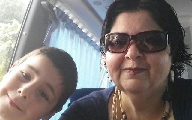 Elia Halpern and her son riding the Noa Tnua bus to Tel Aviv, 2016. (Courtesy of Halpern) 