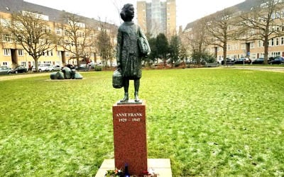 Erected in 2005, a statue of Anne Frank stands close to the Frank family's former apartment in Amsterdam's River Quarter, January 2017 (Matt Lebovic/The Times of Israel)