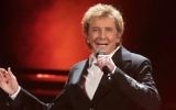 Barry Manilow performs in concert during his 'One Last Time! Tour 2016' in Hershey, Pa., March 17, 2016. (Owen Sweeney/Invision/AP)