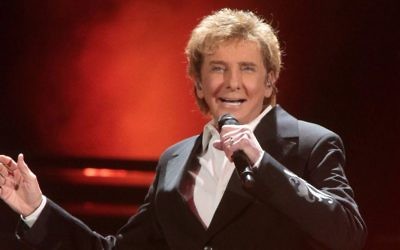 Barry Manilow performs in concert during his 'One Last Time! Tour 2016' in Hershey, Pa., March 17, 2016. (Owen Sweeney/Invision/AP)