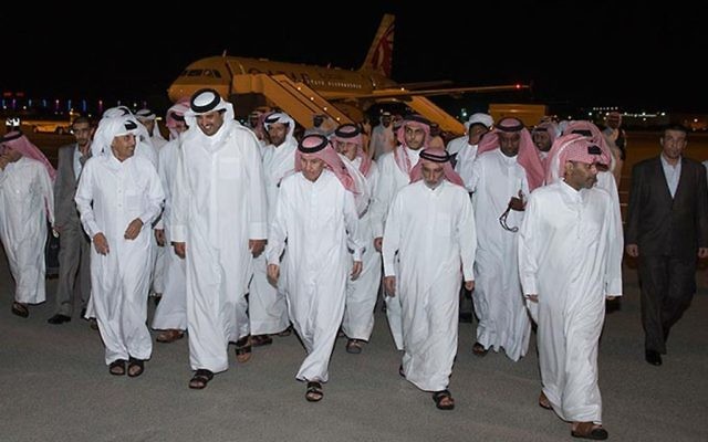 Emir of Qatar Sheikh Tamim bin Hamad Al Thani, second left in front row, receives the released Qatari hostages at the Doha airport in Doha, Qatar, April 21, 2017. (Qatar News Agency via AP) Emir of Qatar Sheikh Tamim bin Hamad Al Thani, second left in front row, receives the released Qatari hostages at the Doha airport in Doha, Qatar, April 21, 2017. (Qatar News Agency via AP)