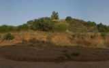 The red hill seen from Kibbutz Givat Brenner that inspired the name of biotech company RedHill (Courtesy)