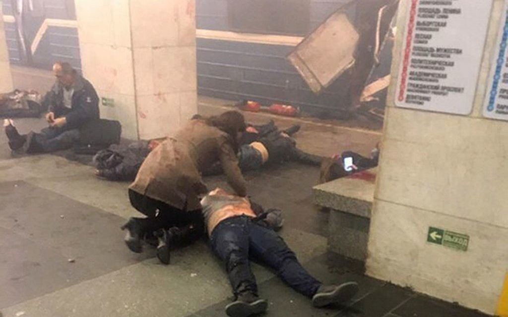 Blast victims lie near a subway train hit by a explosion at the Tekhnologichesky Institut subway station in St.Petersburg, Russia, Monday, April 3, 2017.  (AP Photo/www.vk.com/spb_today via AP)