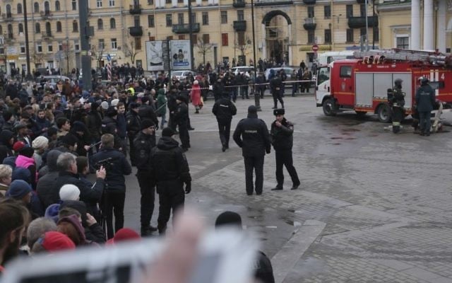 Russian police and emergency service officers block an area next to fire trucks at Sadovaya Square after explosion in St.Petersburg subway in St. Petersburg, Russia, Monday, April 3, 2017. (AP Photo/Yevgeny Kurskov) Russian police and emergency service officers block an area next to fire trucks at Sadovaya Square after explosion in St.Petersburg subway in St. Petersburg, Russia, Monday, April 3, 2017. (AP Photo/Yevgeny Kurskov)
