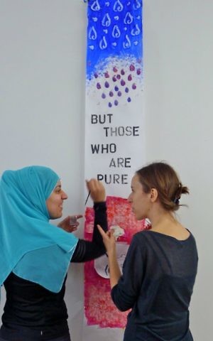 Sara Abdel-Latif (left) and Hannah Mayne participate in 'Blood, Milk & Tears' in Toronto, Canada, 2017 (Evelyn Tauben) Sara Abdel-Latif (left) and Hannah Mayne participate in 'Blood, Milk & Tears' in Toronto, Canada, 2017 (Evelyn Tauben)