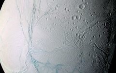 This June 28, 2009 image provided by NASA, taken by the international Cassini spacecraft, shows Enceladus, one of Saturn's moons. (AP Photo/NASA)