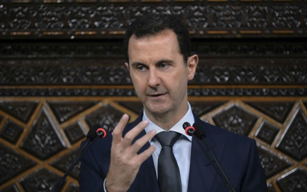 Syrian President Bashar Assad addresses the newly elected parliament in Damascus, Syria, on June 7, 2016. (SANA, the Syrian official news agency, via AP)
