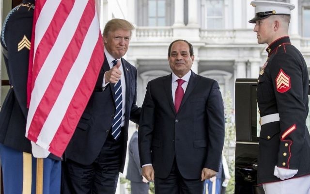 President Donald Trump gives a thumbs up to members of the media as he greets Egyptian President Abdel Fattah el-Sissi at the White House on April 3, 2017. (AP Photo/Andrew Harnik) President Donald Trump gives a thumbs up to members of the media as he greets Egyptian President Abdel Fattah el-Sissi at the White House on April 3, 2017. (AP Photo/Andrew Harnik)