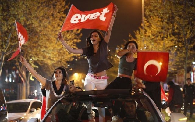 Supporters of the "Yes" vote, wave flags during celebrations in Istanbul, on Sunday, April 16, 2017. (AP Photo/Emrah Gurel) Supporters of the "Yes" vote, wave flags during celebrations in Istanbul, on Sunday, April 16, 2017. (AP Photo/Emrah Gurel)