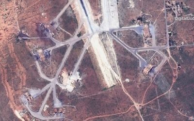 This satellite image provided by DigitalGlobe shows an image captured on April 7 of destroyed aircraft shelters on the southeast side of the Shayrat air base in Syria, following US Tomahawk Land Attack Missile strikes on Friday, April 7, 2017 from the USS Ross (DDG 71) and USS Porter (DDG 78). (DigitalGlobe via AP)
