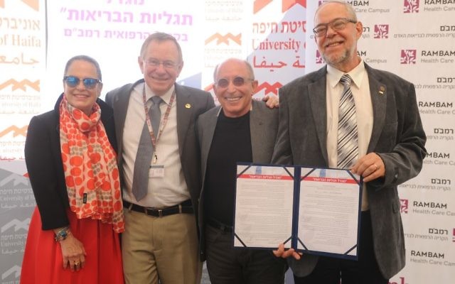 Dr. Esty Golan, far left, director of Rambam Health Care Campus; Prof. Rafi Beyar; University of Haifa President Prof. Ron Robin, University of Haifa Prof. Gustavo Mesch, far right, at the unveiling of Haifa University and Rambam hospital partnership (Courtesy University of Haifa) Dr. Esty Golan, far left, director of Rambam Health Care Campus; Prof. Rafi Beyar; University of Haifa President Prof. Ron Robin, University of Haifa Prof. Gustavo Mesch, far right, at the unveiling of Haifa University and Rambam hospital partnership (Courtesy University of Haifa)