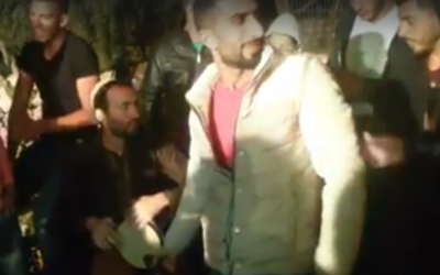 An Israeli man drumming at a Palestinian wedding. (Screen capture: Facebook)