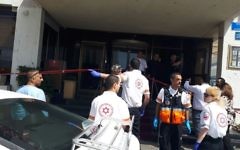 Magen David Adom paramedics arrive at the scene of a suspected terror attack outside of a Tel Aviv hotel on April 23, 2017. (courtesy)