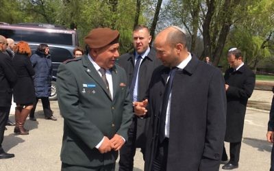 IDF Chief of Staff Gadi Eisenkot (r) and Education Minister Naftali Bennett join participants in the March of the Living in Auschwitz concentration camp, April 24, 2017 (Courtesy) IDF Chief of Staff Gadi Eisenkot (r) and Education Minister Naftali Bennett join participants in the March of the Living in Auschwitz concentration camp, April 24, 2017 (Courtesy)