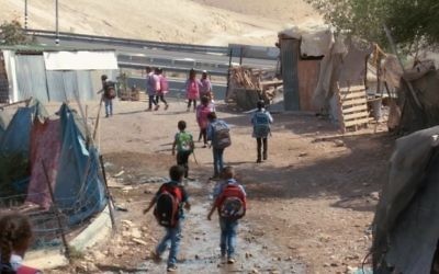 Schoolchildren in the West Bank Bedouin village of Khan al-Ahmar. (YouTube screenshot)