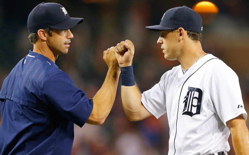 Detroit Tigers manager Brad Ausmus, left, and second baseman Ian Kinsler celebrating a win over the Seattle Mariners at Comerica Park in Detroit, July 20, 2015. They are two of the most prominent Jews in the majors this year. (Leon Halip/Getty Images/via JTA) Detroit Tigers manager Brad Ausmus, left, and second baseman Ian Kinsler celebrating a win over the Seattle Mariners at Comerica Park in Detroit, July 20, 2015. They are two of the most prominent Jews in the majors this year. (Leon Halip/Getty Images/via JTA)