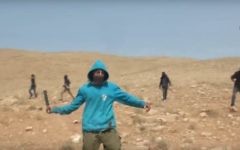 An attacker is seen lifting his bat just before attacking Rabbi Arik Asherman in the West Bank, on Friday, April 21 2017 (Screen capture YoTube)