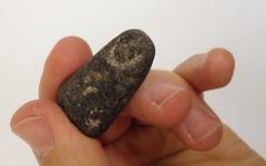 Fragment of a stone finger from what archaeologists suspect may have been an Egyptian statue, found in the fill removed from the Temple Mount. (Temple Mount Sifting Project)