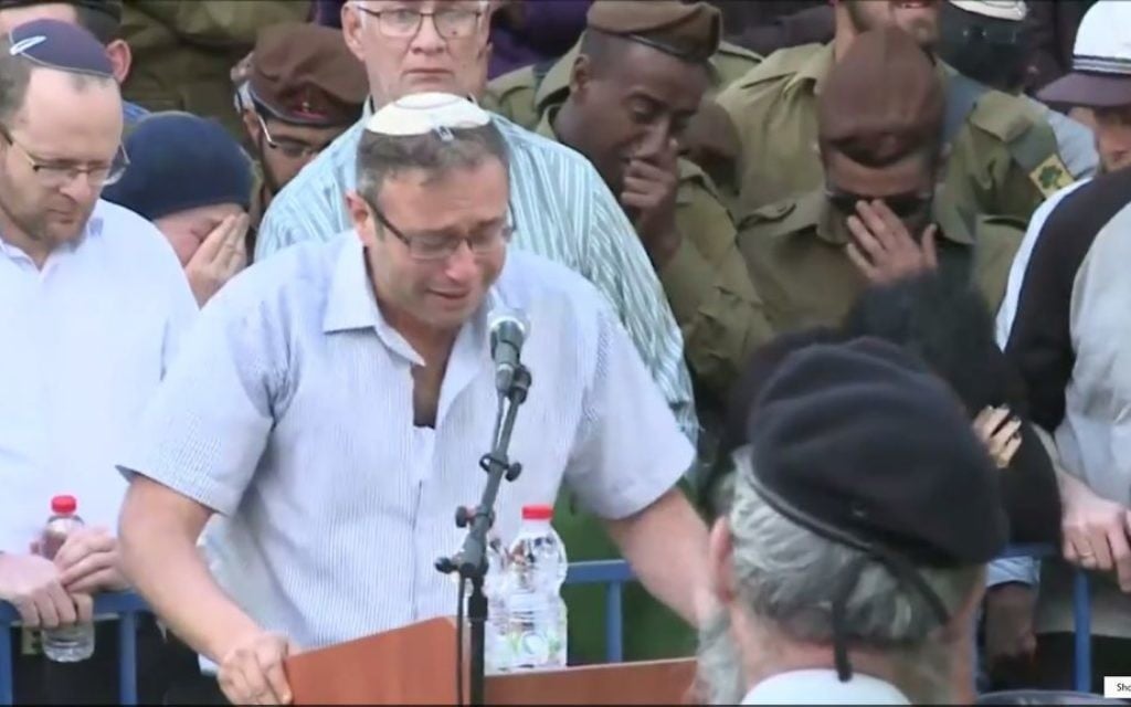 Rabbi Ohad Teharlev eulogizes his son Elhai who was killed in a car-ramming attack in the West Bank, at his funeral in Jerusalem's Mount Herzl military cemetery on April 6, 2017. (Screen capture: Ynet)
