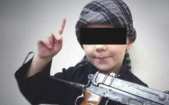 A young boy believed to be the eight-year-old son of Australian Islamic State fighter Khaled Sharrouf making threats against Australians in a home video. (Screen capture: YouTube) A young boy believed to be the eight-year-old son of Australian Islamic State fighter Khaled Sharrouf making threats against Australians in a home video. (Screen capture: YouTube)