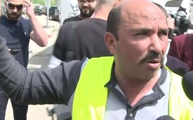 East Jerusalem truck driver Mazen Shwieki speaks to reporters after footage of an Israel Police officer brutally assaulting him was posted online on March 23, 2017. (Screen capture/YouTube) East Jerusalem truck driver Mazen Shwieki speaks to reporters after footage of an Israel Police officer brutally assaulting him was posted online on March 23, 2017. (Screen capture/YouTube)