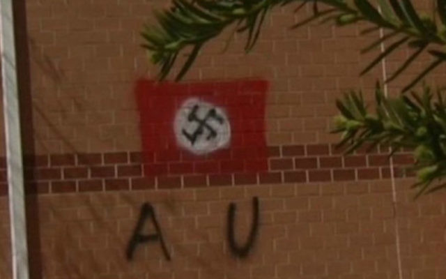 A swastika daubed on the Jewish community center in northern Virginia, April 11, 2017. (Screenshot from NBC Washington via JTA) A swastika daubed on the Jewish community center in northern Virginia, April 11, 2017. (Screenshot from NBC Washington via JTA)