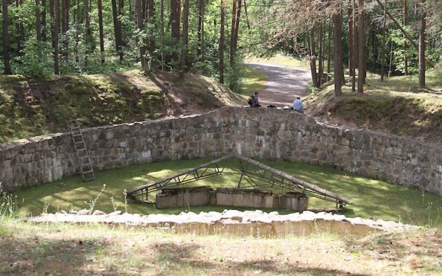 The infamous “Burning Pit” used by the Nazis to burn the remains of their Jewish victims in order to rid themselves of all evidence. (Ezra Wolfinger for WGBH/JTA)