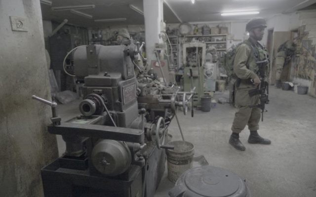IDF soldiers seize machinery allegedly used to illegally make guns in Hebron on April 10, 2017. (IDF Spokesperson's Unit) IDF soldiers seize machinery allegedly used to illegally make guns in Hebron on April 10, 2017. (IDF Spokesperson's Unit)